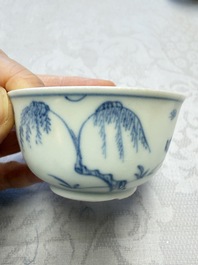 A pair of Chinese blue and white 'Ca Mau' shipwreck cups and saucers, Yongzheng