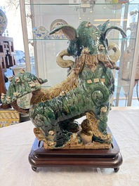 A pair of large Chinese polychrome-glazed Shiwan stoneware Buddhist lions, 19th C.