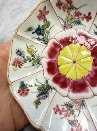 A rare Chinese famille rose moulded cup and saucer with floral design, Yongzheng