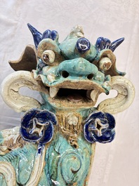 A pair of large Chinese polychrome-glazed Shiwan stoneware Buddhist lions, 19th C.