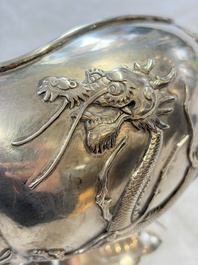 A fine Chinese silver bowl with relief dragon design on reticulated wooden stand, Tai Chang Long 泰昌隆 mark, 19th C.