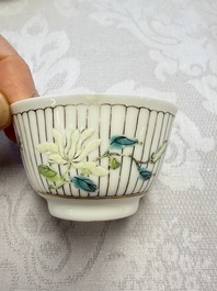 A Chinese famille rose cup and saucer with floral design, Yongzheng