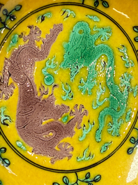 A small Chinese yellow-ground aubergine and green enamelled dragon plate, Qianlong mark, 19/20th C.