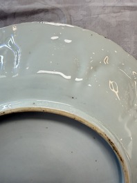 A pair of Chinese blue and white moulded dishes with dancing ladies, Kangxi
