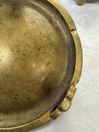 A fine Chinese bronze tripod censer and stand, Xuande mark, 17/18th C.