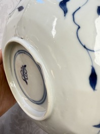 A pair of Chinese blue and white flower-shaped 'Long Eliza' plates, Kangxi