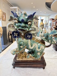 A pair of large Chinese polychrome-glazed Shiwan stoneware Buddhist lions, 19th C.