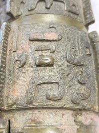 A Chinese archaic bronze wine vessel with Taotie design, Zun 尊, late Shang