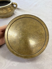 A fine Chinese bronze censer with loop handles and stand, Xuande mark, 18th C.
