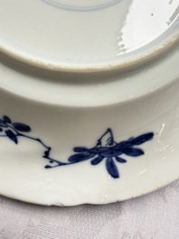 Eleven Chinese blue and white gadrooned 'Flowers and Peacocks' plates, Kangxi