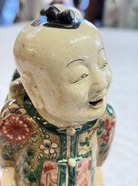 A pair of Chinese verte biscuit 'Piggyback Boys' groups, Kangxi