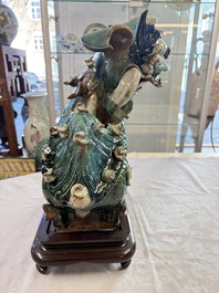 A pair of large Chinese polychrome-glazed Shiwan stoneware Buddhist lions, 19th C.