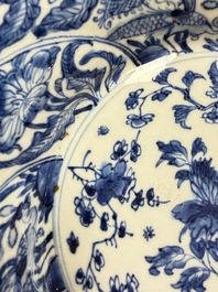 Eleven Chinese blue and white gadrooned 'Flowers and Peacocks' plates, Kangxi