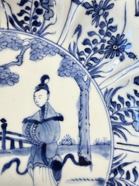 A pair of Chinese blue and white moulded dishes with dancing ladies, Kangxi