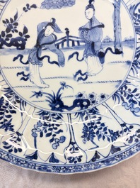 A pair of Chinese blue and white moulded dishes with dancing ladies, Kangxi