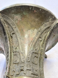 A Chinese archaic bronze wine vessel with Taotie design, Zun 尊, late Shang