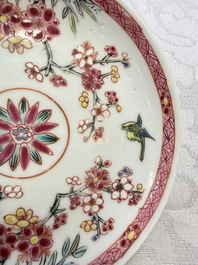 Three Chinese famille rose 'Birds and Plum Trees' cups and saucers, Yongzheng