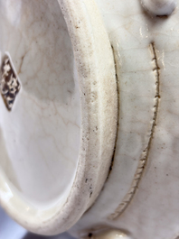 A Chinese Nanking white-glazed 'hu' vase with figural relief design, 19th C.
