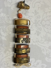 A fine Japanese four-case metal-inlaid lacquer 'Kanshin' inrō by Kōzan with a red coral ojime and a 'Jurojin' netsuke, Kōzan 光山 mark, Edo
