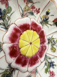 A rare Chinese famille rose moulded cup and saucer with floral design, Yongzheng