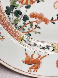 Three Chinese famille verte plates with floral design, one powder-blue-ground, Kangxi