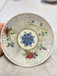 A Chinese famille rose cup and saucer with floral design, Yongzheng