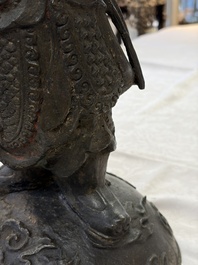 A Chinese bronze model of Weituo, Ming