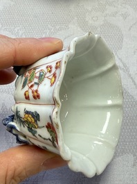 A rare Chinese famille rose moulded cup and saucer with floral design, Yongzheng