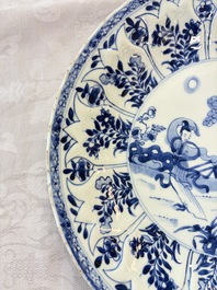 A pair of Chinese blue and white moulded dishes with dancing ladies, Kangxi
