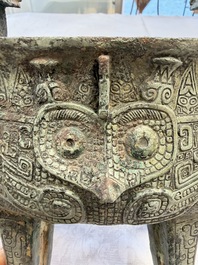 A Chinese archaic bronze wine vessel with owl design, Jia 斝, late Shang