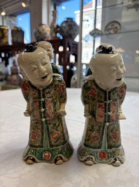 A pair of Chinese verte biscuit 'Piggyback Boys' groups, Kangxi