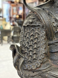 A Chinese bronze model of Weituo, Ming