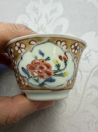 Six Chinese famille rose gilt-decorated 'Flower Basket' cups and saucers, Yongzheng/Qianlong