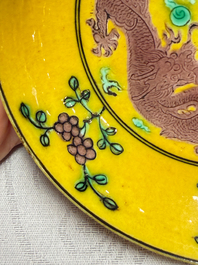 A small Chinese yellow-ground aubergine and green enamelled dragon plate, Qianlong mark, 19/20th C.