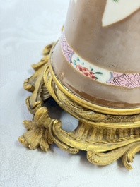 A pair of gilt-bronze-mounted Chinese famille rose capucine-ground vases and a covered bowl, Qianlong