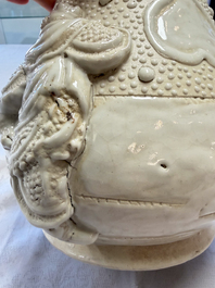 A Chinese Nanking white-glazed 'hu' vase with figural relief design, 19th C.