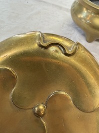 A fine Chinese bronze tripod censer and stand, Xuande mark, 17/18th C.