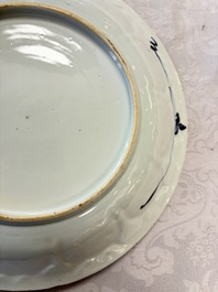 A pair of Chinese blue and white moulded dishes with dancing ladies, Kangxi