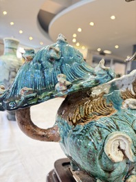 A pair of large Chinese polychrome-glazed Shiwan stoneware Buddhist lions, 19th C.