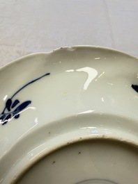 Eleven Chinese blue and white gadrooned 'Flowers and Peacocks' plates, Kangxi