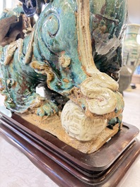 A pair of large Chinese polychrome-glazed Shiwan stoneware Buddhist lions, 19th C.