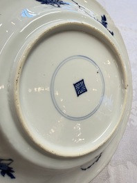 Eleven Chinese blue and white gadrooned 'Flowers and Peacocks' plates, Kangxi
