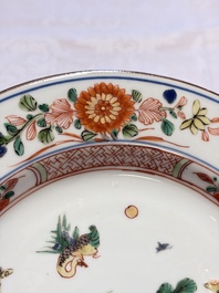 Three Chinese famille verte plates with floral design, one powder-blue-ground, Kangxi