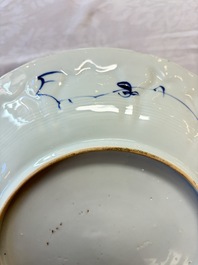 A pair of Chinese blue and white moulded dishes with dancing ladies, Kangxi