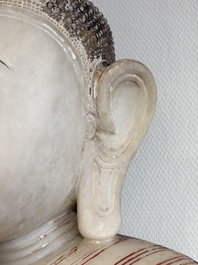 A monumental Burmese white marble Post-Pagan Buddha with traces of gilt-lacquer, Ava Kingdom, 17th C