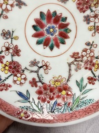 Three Chinese famille rose 'Birds and Plum Trees' cups and saucers, Yongzheng