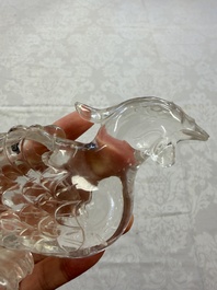 Three Chinese rock crystal sculptures on wooden stands, Republic