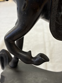 A large Chinese bronze horse-shaped incense burner and cover, 17/18th C.