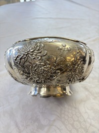 A fine Chinese silver bowl with relief dragon design on reticulated wooden stand, Tai Chang Long 泰昌隆 mark, 19th C.