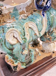 A pair of large Chinese polychrome-glazed Shiwan stoneware Buddhist lions, 19th C.